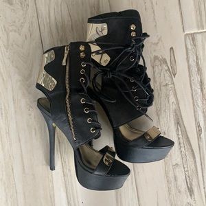 Black lace up heels with gold hardware